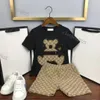 高級デザイナー服セット子供 Tシャツ白黒モノグラムショートファッション英国ファッションブランド夏子供宝物女の子綿ツーピーストップス