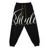 メンズショーツRhude Summer Designer Beach Pants Rhude Knitted Jacquard Alphabet High Street American Drawstringレギンストレンディブランドルースカジュアルウールパンツ男性