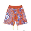 Designer Short Fashion Casual Clothing Beach shorts Rhude Trendy Color Matching Cashew Flower Jacquard Drawstring Knitted Shorts High Street Loose Fitting Mens Wo