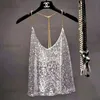 Canotte da donna Camis Sexy Club Catene di metallo Paillettes Halter Canotta Donna Mini Perline Canotta Allentata Backless Oro metallizzato Cinghie lucide Canotta Party Top T230417