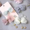 かわいい子供の女の子のヘアクリップ糸星弓弓弓bull hairpins barrettes haarspeldjesスパンコールベビーヘアアクセサリー289b