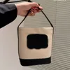 Bolso de cubo Crossbody Bolsos de lona Diseñador de lujo Marca Moda Bolsos de hombro Bolsos de alta calidad Mujeres Carta Monedero Bolso de teléfono Monedero Metálico