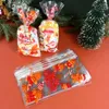 Praço de presente 50pcs Feliz Natal Bolsas de doces de biscoito Snowflake saco de plástico de Papai Noel para ano em casa