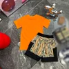 T-shirt per ragazzi 23ss Pantaloncini completi per bambini set per bambini abiti firmati Girocollo Stampa logo lettera in puro cotone Manica corta Pantaloncini cargo scozzesi adatti a vestiti per bambini