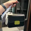 Satchel triomphe çanta lüks tasarımcı marka çantaları moda omuz çantaları şeritler çanta yüksek kaliteli kadınlar mektup çanta telefon çantası cüzdan metalik bayan düz