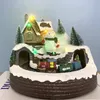 Julekorationer Santa Claus Shining Music Small House Decoration Tree Spinning Train Snowy Gift 231117