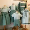 Rompers 2023 İspanyol Bebek Giysileri Çocuk Kardeş Kardeş Eşleştirme Kıyafet Erkekler 2pcs Set Küçük Kız Elbise Kızlar Yeşil Etek Takım 230417