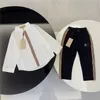 Nueva generación Primavera Bebé diseñador solapa camisa de manga larga + pantalones cargo traje de niño de marca casual Tamaño 90-150 cm A03