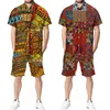 Survêtements pour hommes Imprimé africain Série Totem Ensemble hawaïen pour hommes Revers Chemise décontractée à manches courtes / Shorts de plage / Costume Style ethnique d'été