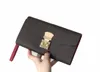 Modedesigner plånböcker lyx kvinnor långa plakesbruna blommor brev kreditkortshållare damer smala pläd pengar koppling väskor hög kvalitet