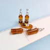 10 pièces nouvelle bouteille de bière résine boucle d'oreille breloques bouteille de boisson pour porte-clés collier pendentif résultats de bijoux breloque flottante C228 Fashion JewelryCharms beer Bottle