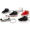Keychains Lanyards 34 Styles Designer Mini 3D Basketball Shoes Stereoskopiska sneakers Key Chain Car Ryggsäckhängen Drop Leverans DHV8s