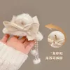 Jesienne i zimowe nowe pluszowe wydanie studenckie Tassel Sen Women Shark Hair Clip