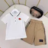 23ss kids set jongens Poloshirt Shorts pak kids designer kleding revers logo borduren T-shirts met korte mouwen Lattice splicing shorts pakken Hoge kwaliteit babykleertjes