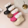 Bottes de qualité hiver nouvelle semelle épaisse à manches moyennes portant de la neige pour les femmes imperméable polyvalente plus peluche épaissie confortable coton chaud