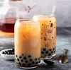 US Stock 16oz Sublimation Glass Mokken Cup Bekopen met bamboe -deksel Frosted bier blikje bril Sneeuwbol Tumbler Mason Jar Plastic stro