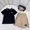 23ss kids set jongens Poloshirt Shorts pak kids designer kleding revers logo borduren T-shirts met korte mouwen Lattice splicing shorts pakken Hoge kwaliteit babykleertjes a1