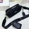 Marque classique Messenger Bag sac à main Designer bagages sac à main hommes et femmes sacs de week-end en plein air 197