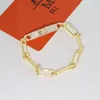 14F0 Charm Bracelets Designer Charm Bransoletka Diamond łańcuch Gold Hollow Fashion Metal Class