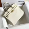 Platinum Bag Designer Tote High End Quality Togo Leather Lychee Mönster Huvudlager Kalvläder Handväska Lås kvinnor