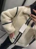 Womens päls faux konstgjorda päls lapel skarvning arbete blixtlås kvinnor kappa långärmad bälte cykeljacka Autumnwinter mode casual 231118