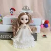 Dockor 17cm BJD GIRLS DOLL MOVERABLE JOINTS PRINCESS DRESS 3D EYES CONVERTIBLE KLÄNNING MINI Toys For Christmas Gifts 231117