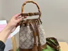 Designer-Bambus-Eimertasche, Top-Luxus-Crossbody-Umhängetaschen, Handtasche für Damen, Mini-Handtaschen aus Leder, Großhandel, abnehmbarer Schultergurt, 19 cm