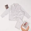 Kvinnor S Sleepwear Two Piece Imitated Silk Women Satin Pyjama Ställer in långärmad toppbyxor Home Suit Spring Autumn Elegant Temperament 231117
