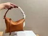 أزياء Loe Crossbody Bag Women's Large Sutly sthipper فتح الجلود الفاخرة متعددة الاستخدامات حقيبة تسوق بسيطة معرف Michafl_kops