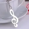 Llavero de nota musical de metal Llavero de regalo Llavero de coche de lujo fresco Llavero colgante de bolsa musical Llaveros para hombre Mujer Joyería de regalo Joyería de regalo