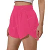 NWT 2021 Kvinnor som kör shorts Zipper Pockeks Sport Shorts Gym Kort träning Träningssträning Shorts Gratis frakt Yogayoga Shorts Sportkläder Tillbehör