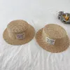 Cappelli Cappelli Cappelli estivi per bambini Cappello di paglia con etichetta Stile coreano Cappello a cilindro in paglia di grano Ragazzi Ragazze Cappello con visiera parasole Protezione solare Cappello da spiaggia per bambini 230418