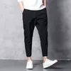 Herenbroek Koreaanse heren elastisch casual potloodbroek enkel lengte lente oversized mannelijke broek mode streetwear zwart kaki groen 230417