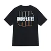 23ss Undefeated T-shirt Hommes T-shirts Designer t-shirts Lâche Respirant Oversize Casual T-shirt 100% Coton Hommes Femmes Doux À Manches Courtes Taille US