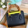 Designers Bags Mulheres Bolsa de Bola Bambo Mulheres Comparação de Fivelas Combinantes de Grande Capacidade Bolsa Compras de Compras Estilo Vintage Moda Crossbodybags 2023