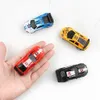 Electric/RC Car Plastic Remote Control Car Battery Operated Remote Control Racing Vehicle LED Lights RC Racing Car with Roadblocks for Kids Boys 231118