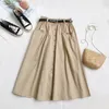 Skirts PEONFLY Autumn Korean Casual Cotton Midi Long Skirt Women Button Pocket Belt A Line High Waist Mid-length Skirt Female 230418