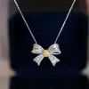 Xiy Fine Jewelry Dainty Women Cute Real Gold 1Ct Diamond Bowknot Pendant Charm Necklace