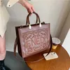 Tasche 26 % RABATT Designer Online Promi-Stickerei Einkaufstasche mit großem Fassungsvermögen neue High-End-Modebrief-Umhängehandtasche mit einer Schulter