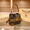 Designer-Handtasche Hong Kong Einkäufer echtes Leder neue Nische Damen tragbarer Eimer ausländischer Stil One-Shoulder-Umhängetasche kleine Tasche