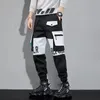 Męskie spodnie Klasyczne spodnie streetwearne Press Męskie Wstążki Harem Jogging Spodnie Mężczyzna Slim Fit Sp z wiosennych spodni Multipockets Kobiety Spodni J7 230417