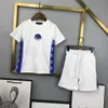 23ss meninos T-shirt Shorts terno crianças conjunto crianças roupas de grife gola redonda algodão puro logotipo bordado fita emenda impressão t-shirt shorts ternos roupas de bebê a1