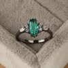 Ringos de cluster S925 Sterling Silver Ring Emerald Emerald Four-Glaw Oval Diamond Personality tingido preto