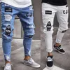 Mäns jeans män stretchig rippad mager cyklist broderi tecknad tryck förstört hål smal fit denim högkvalitativ hiphop svart 230417