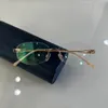 トゥラアイウェア楕円形のリムレスメガネシンプルなオフィススタイルアンチブルーライトリーディングアイプロテクション処方レンズ光学眼鏡男性と女性のメガネ