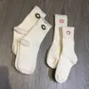 Nya babystrumpor Pure White Toddler Socks Kids Designer Kläder Färgglad broderi Boy Girl Slang Winter Warm Child Pantyhose