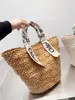 Stro -gevlochten tas Seaside Holiday Straw Tote Grote capaciteit Franse groentemand Zomer Vrijeetporteerbare Vrouw 25 cm