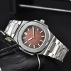 Watch Watch Designer أوتوماتيكي الساعات الميكانيكية عالية الجودة 5711 بوتيك الفولاذ مصمم حزام الساعات للرجال الجملة ساعة هدية الماس