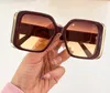 Occhiali da sole quadrati di grandi dimensioni gradiente marrone dorato Donne Designer Sun Glasshi Sonnenbrille Shades Uv400 Eyewear con scatola