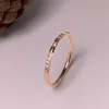 Anillos de banda de lujo que no se desvanecen 316 L Acero inoxidable Pave Micro Zircon Ring Mujer 18 K Chapado en oro Anillo de personalidad de moda que no se desvanece